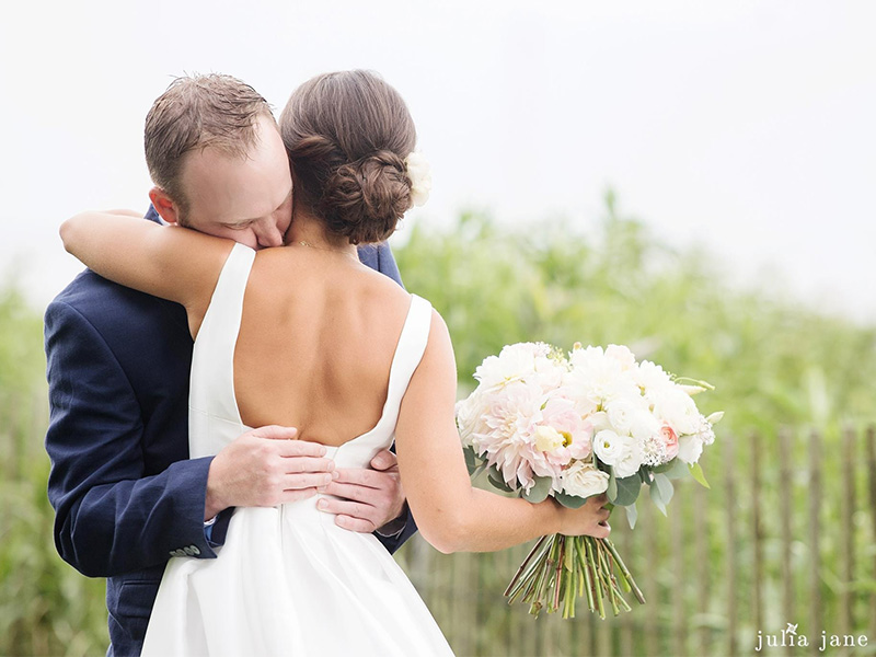 RR_800x600_brunette updo facing groom hug.jpg