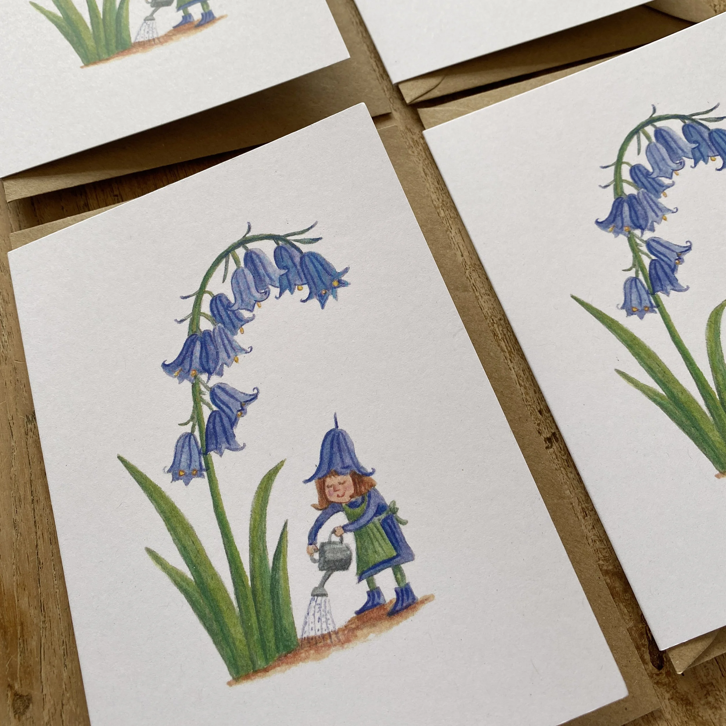 Elf watering bluebells greetings card pack
