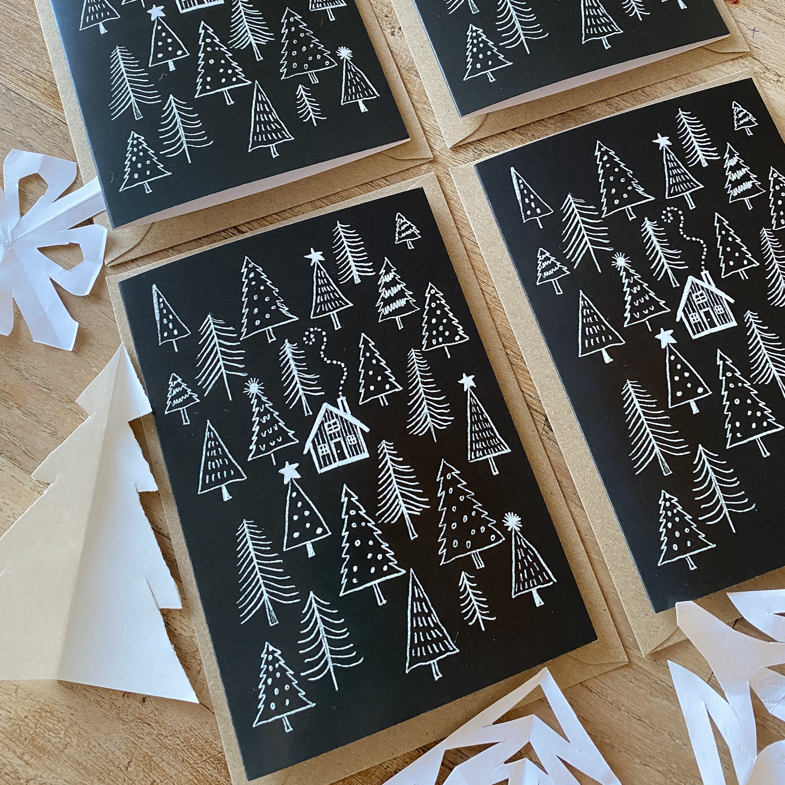 log cabin in pine forest christmas card