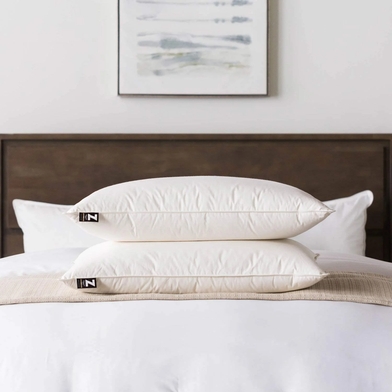 Picture of TripleLayer Down pillow on bed.