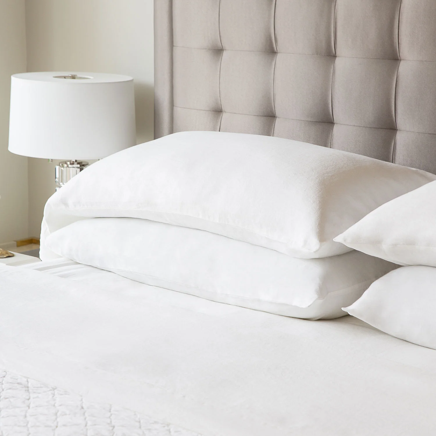 Photo of French Linen Pillow Case on bed.