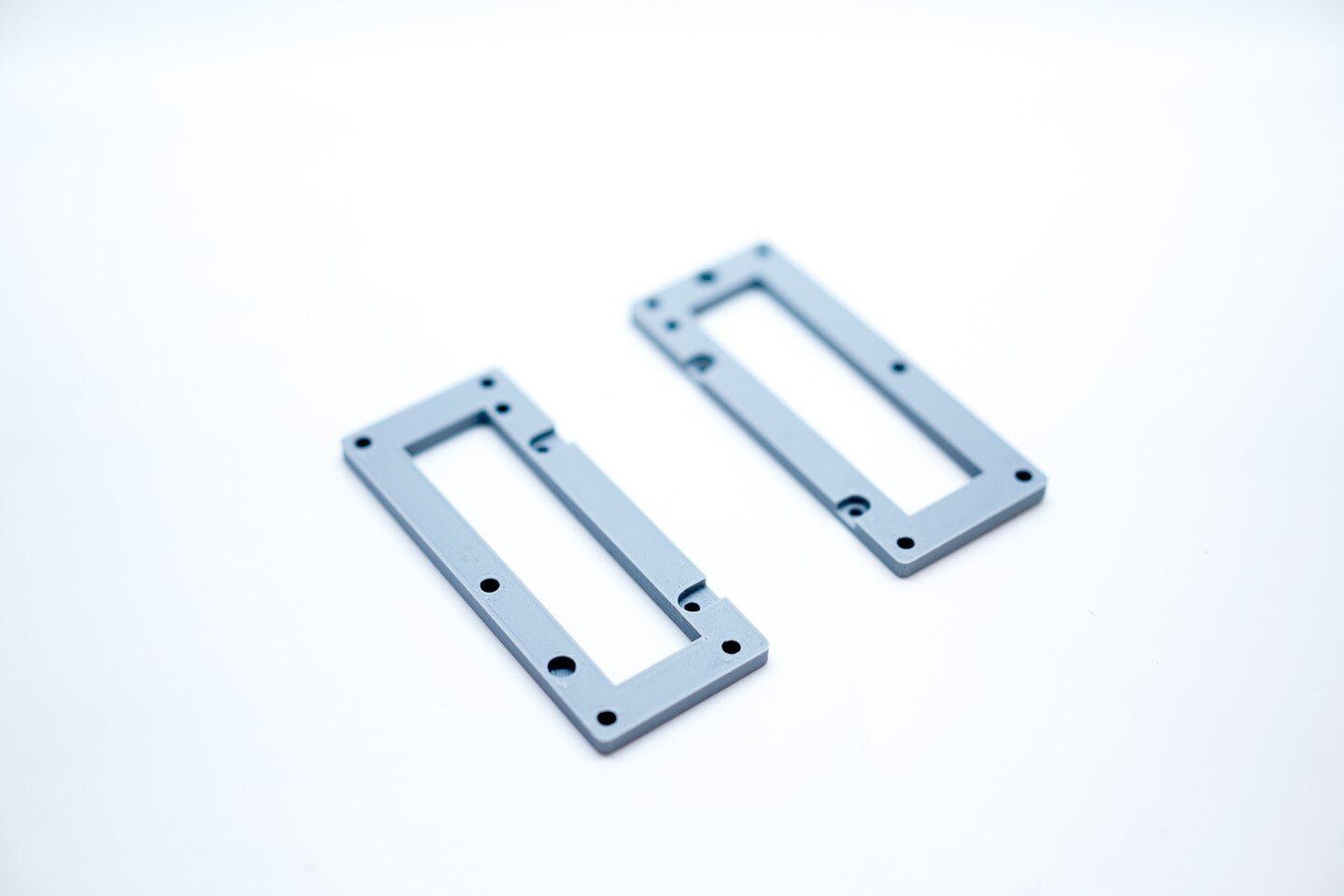 The display brackets are easy to print too, in about 4 hours at 0.15 layer height.  No supports needed either, and a simple round recess to help you line them up on the frame since they're not reversible.