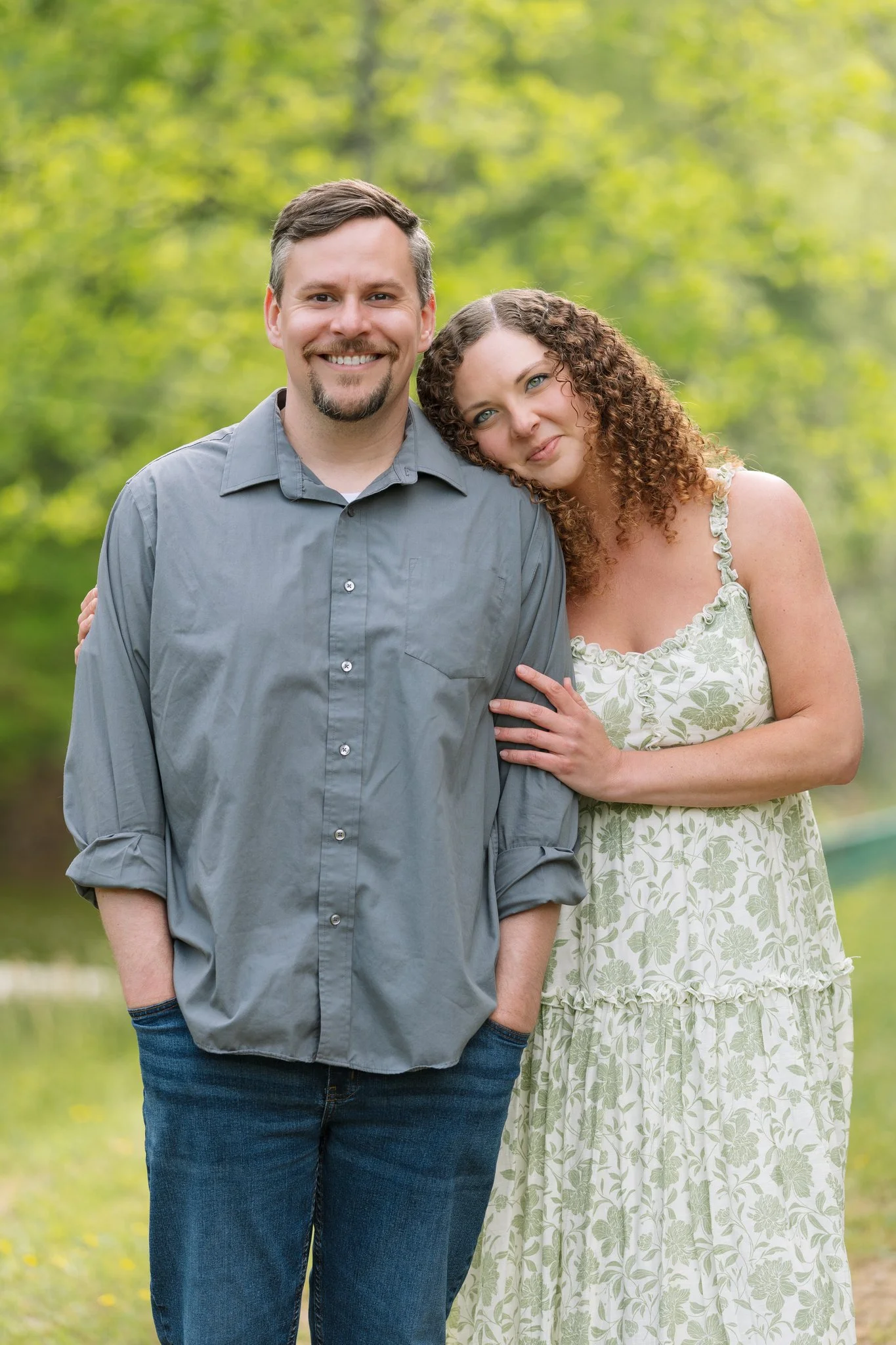 A couple embracing for a Tampa, FL anniversary photo session