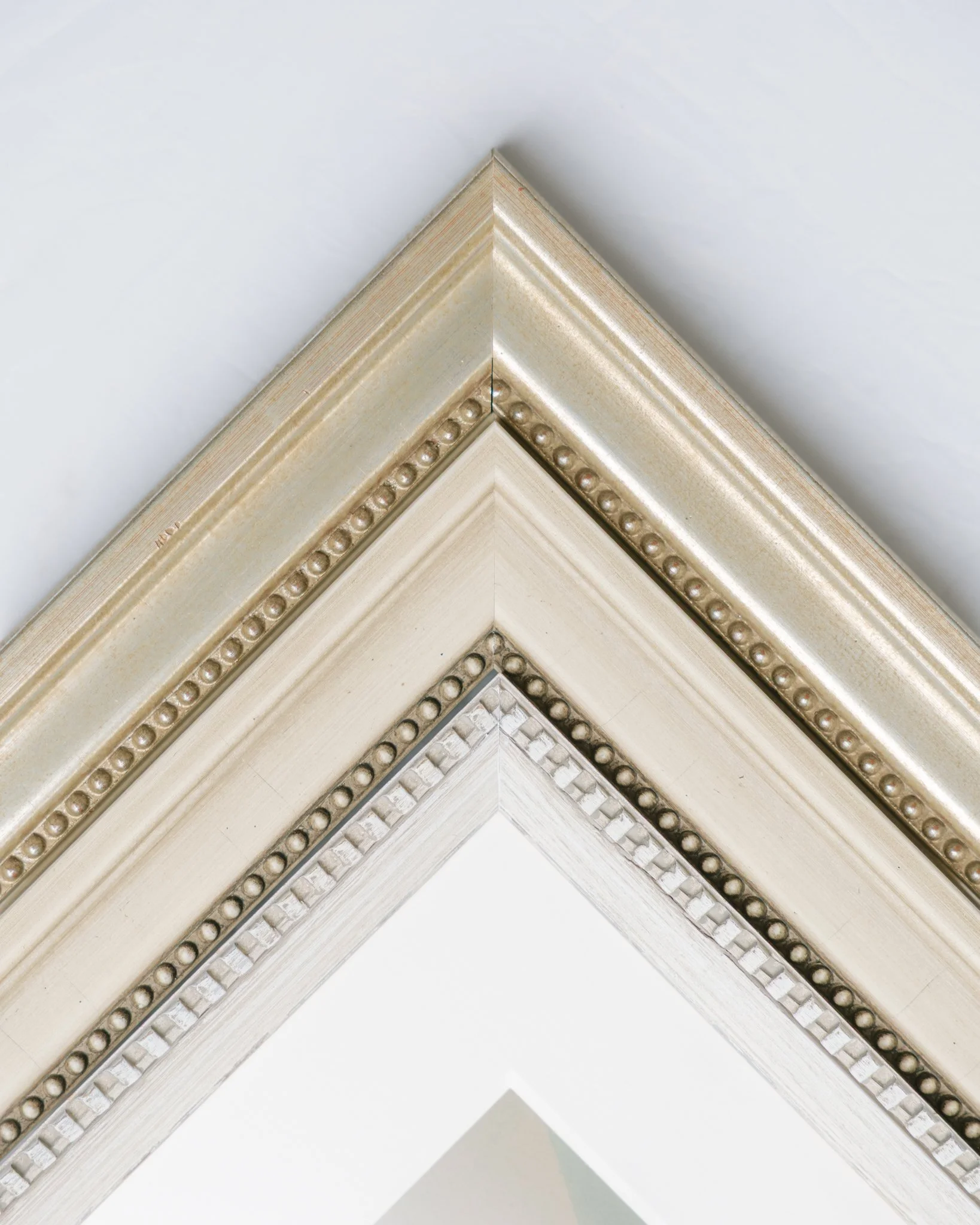 Frame samples for heirloom portraits in Tampa, FL home.