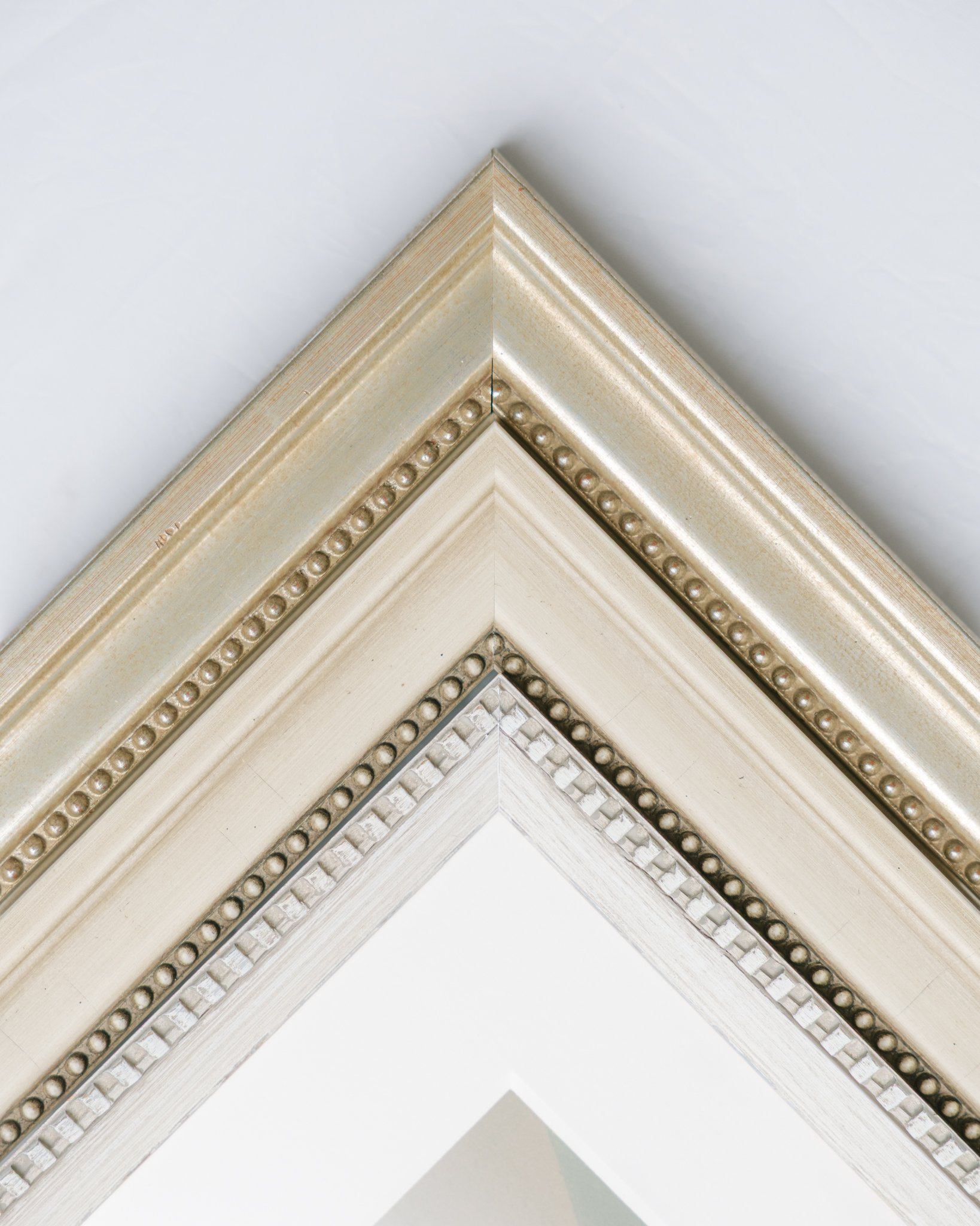 Frame samples of various stains for framed heirloom artwork in Tampa, FL.