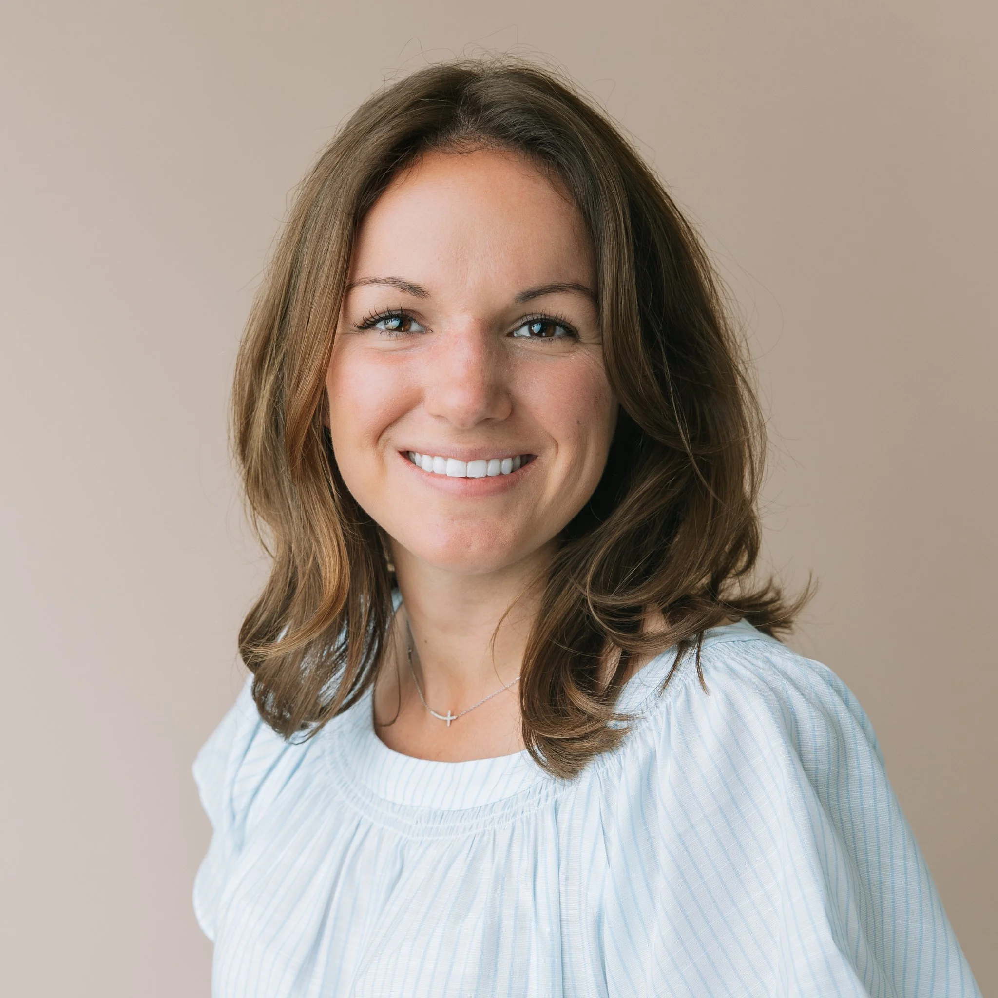 A portrait of Randi Schuette, a family and portrait photographer serving Tampa, FL.