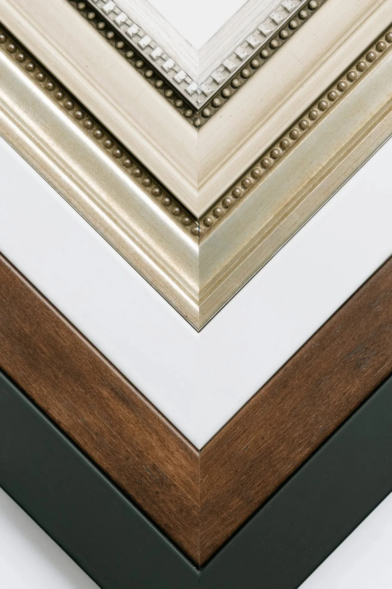 Frame samples of various stains for framed heirloom artwork in Tampa, FL.