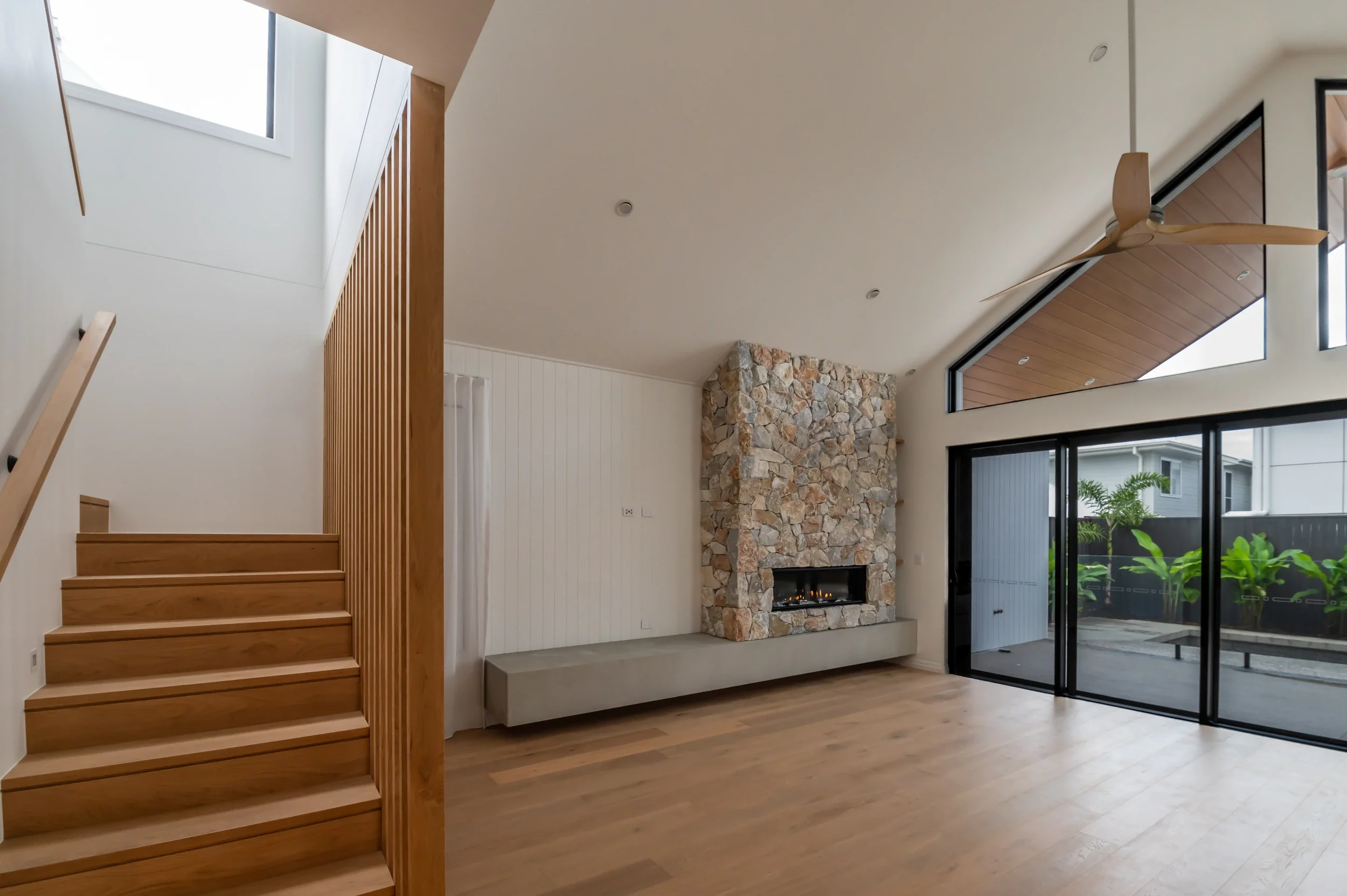 cylinders-74-kingscliff-08-staircase-and-living.webp