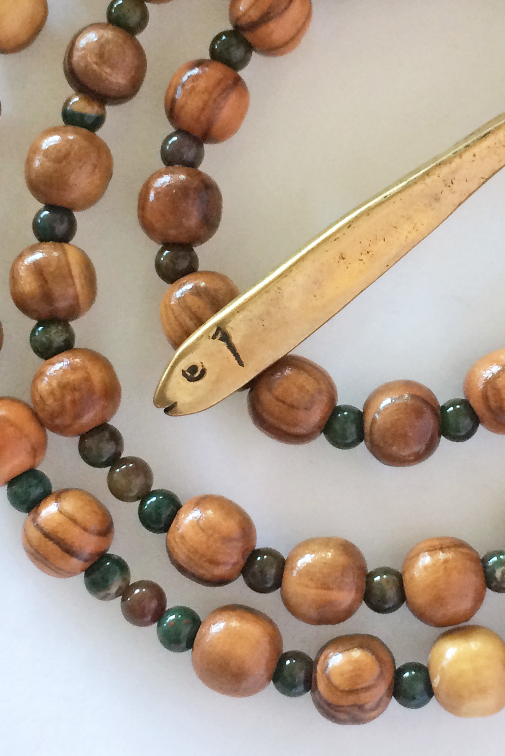 Fishers, olive wood and bloodstone 50-bead prayer rope handmade by Still Stone and Moss Prayer Bead Art. Detail.