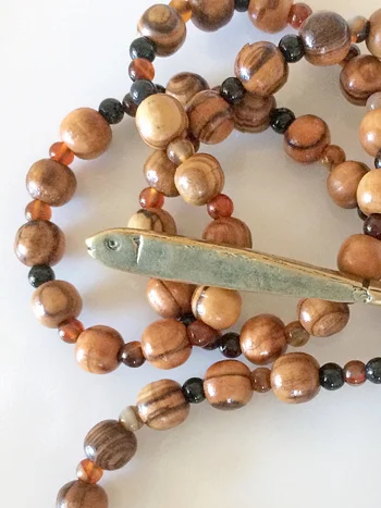 Fishers, olive wood and carnelian 50-bead prayer rope, handmade by Still Stone and Moss Prayer Bead Art. Detail.