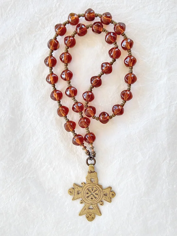 Sunup, 33-bead Czech glass prayer rope, inspired by C.S. Lewis. Handmade by Still Stone and Moss Prayer Bead Art. Full view.