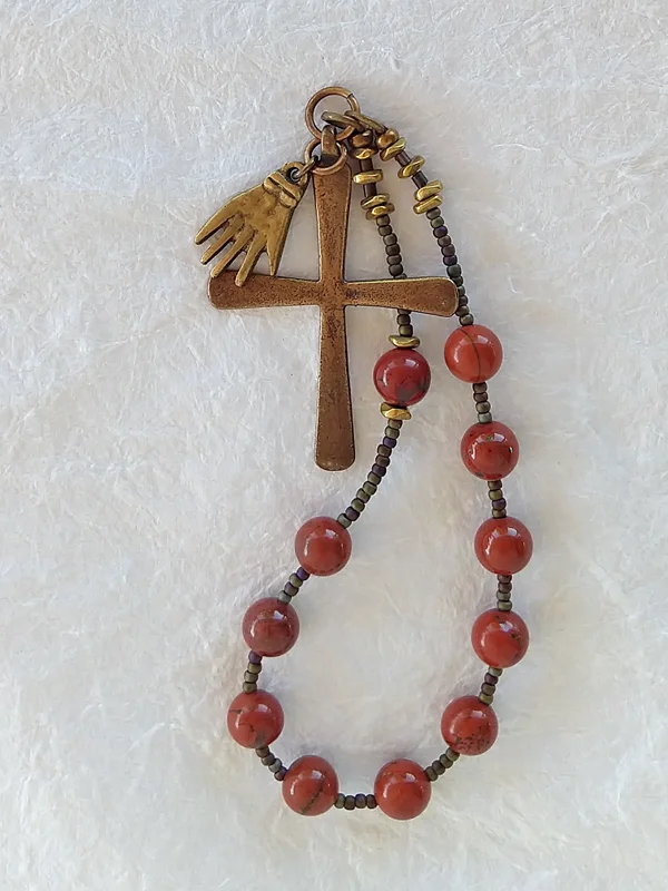 Charity, chaplet handmade with Milagro of an open hand, by Still Stone and Moss Prayer Bead Art. Full view.