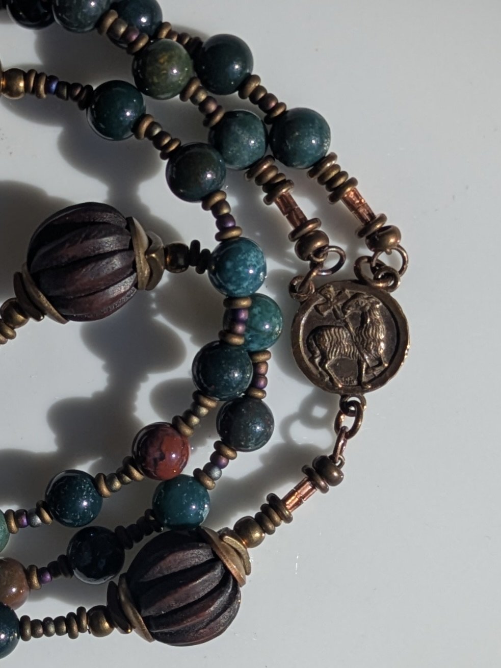 agnus dei bloodstone rosary det.jpeg