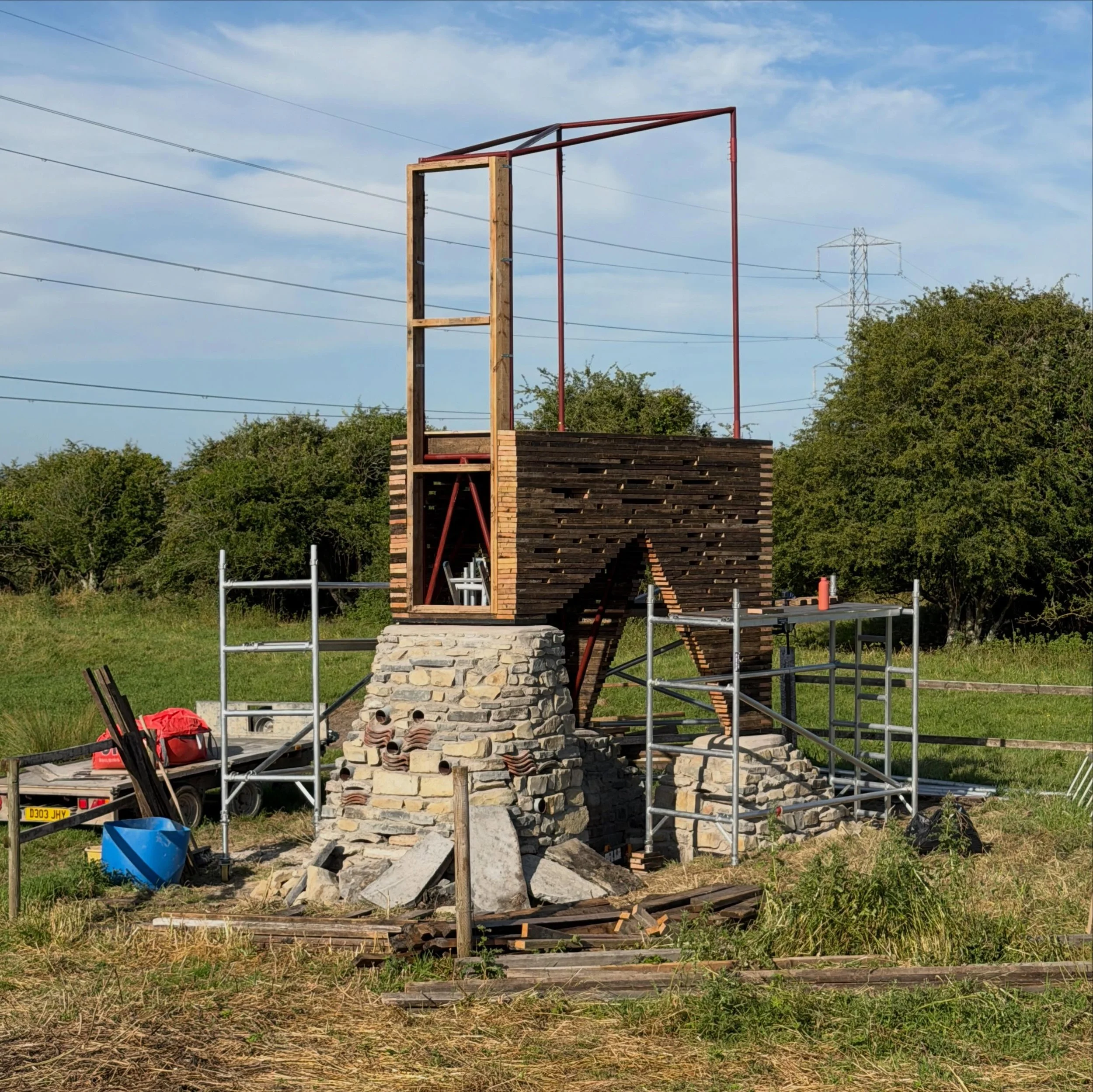 Another week of progress on site.

The floor and rear wall are now in, using reclaimed timber from a barn marked for demolition. The stacked larch legs and lower walls are also complete, made from former walkway boards from Somerset Wildlife Trust&rs