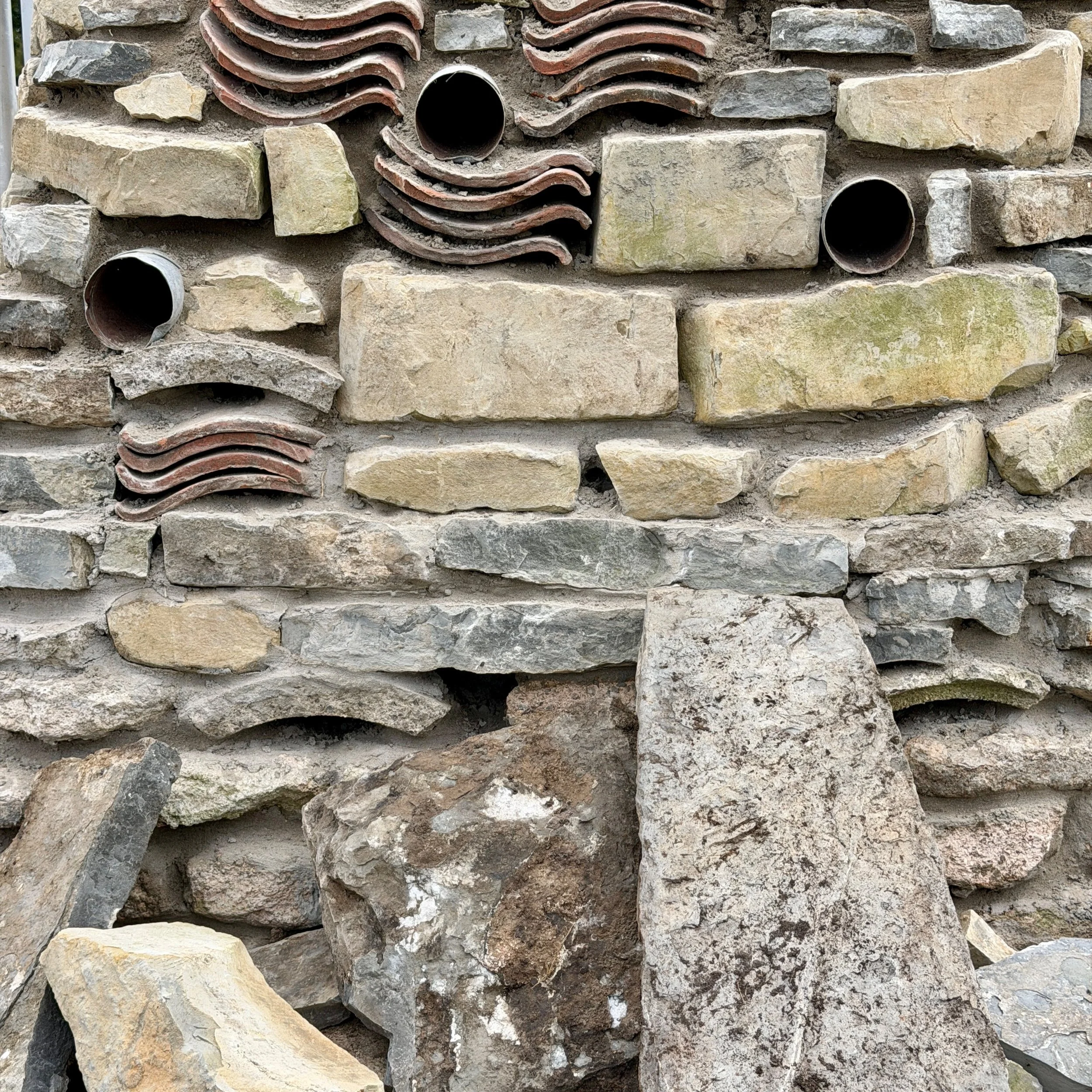Two weeks into our build in the Avalon Marshes with Somerset Wildlife Trust at Honeygar Farm.

The three piers form the lower level of the wildlife tower, creating habitat for small mammals and invertebrates. They are built from materials gathered fr