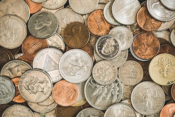 American currency, foreign currency, coin collections, commemorative coins and stamp collections.