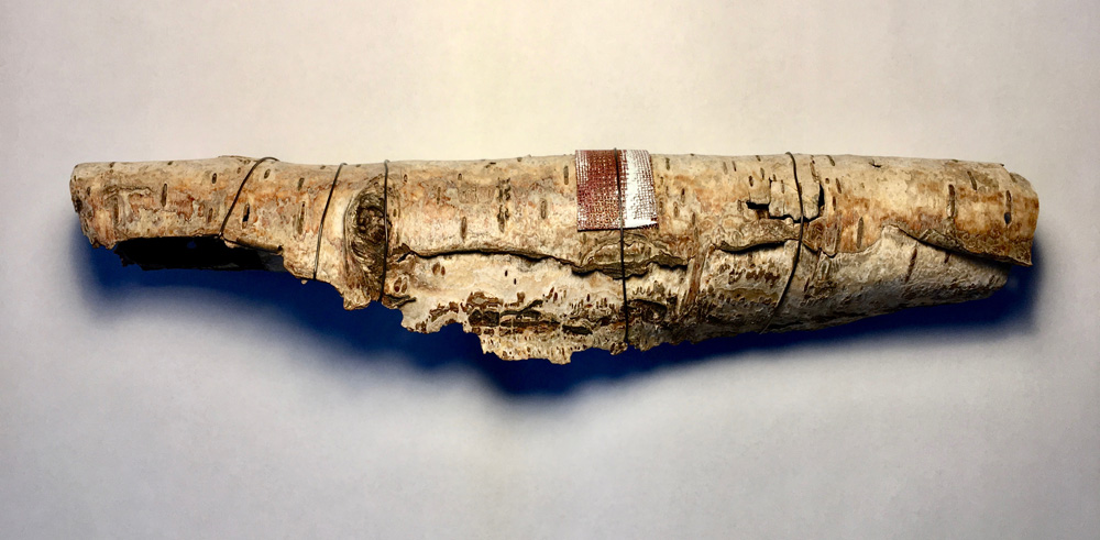 The birch bark is quite fragile so has been strengthened with enamelled copper mesh and iron wire.