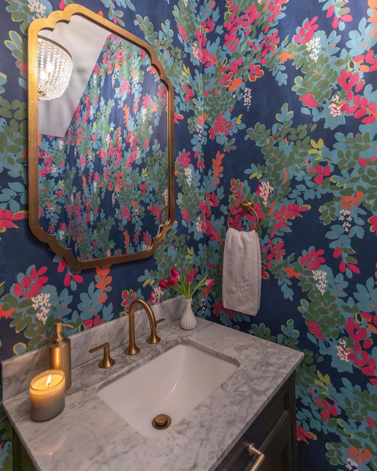 Powder room drama: this is it! We love a dramatic wallpaper in a powder room and our client, despite being a bit fearful of this wallpaper, trusted us&hellip;and boy did we deliver. The wallpaper, new mirror and the CHANDELIER! Coupled together, this