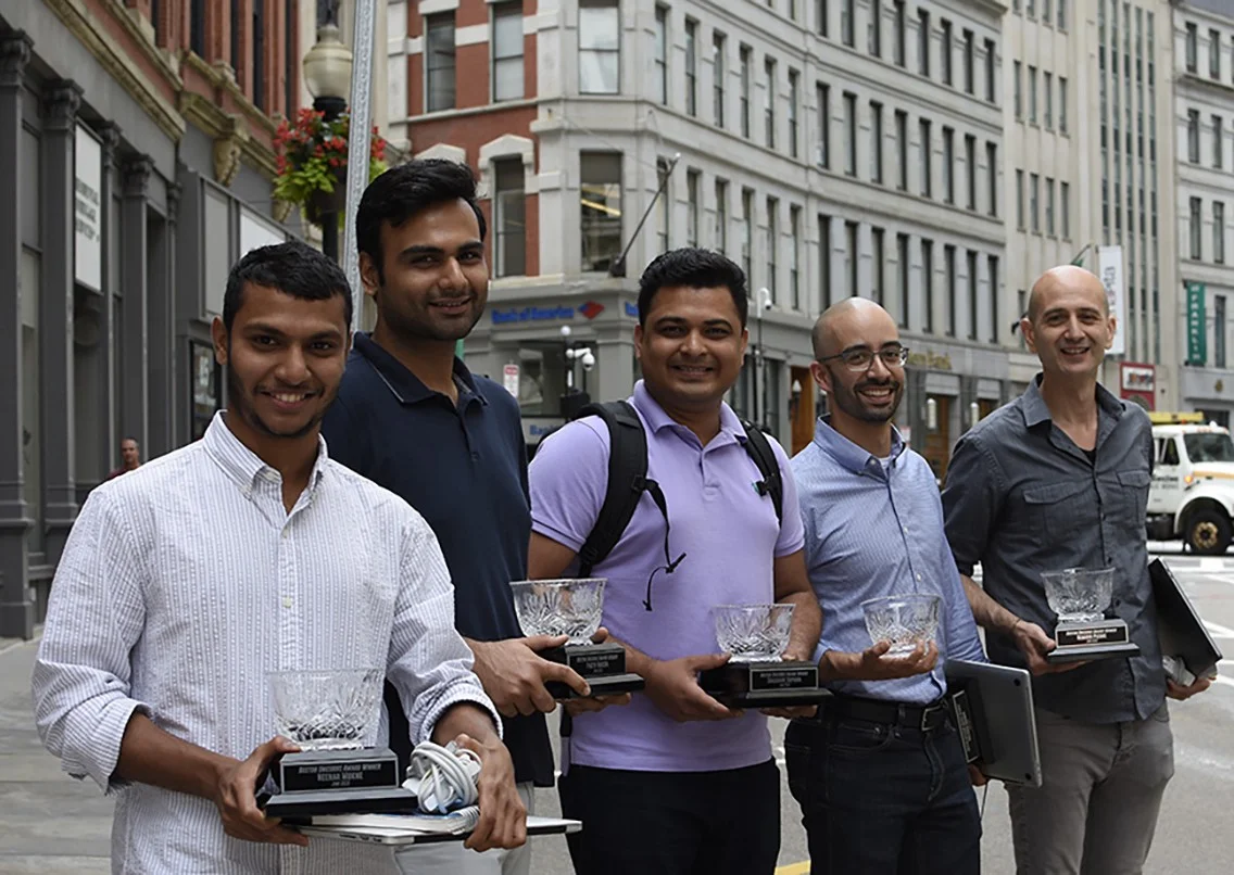 The “Boston Unicorns” hold their trophies and celebrate their win outside the Digitas Boston HQ. Pictured from left to right: Neehar Mukne, Parth Vadera, Shashank Kapadia, Luiz Freitas, Remi Picone. Not pictured: Gulsher Kooner