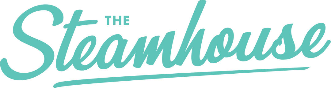 Handwritten script style words, reading 'The Steamhouse' in a light teal colour.