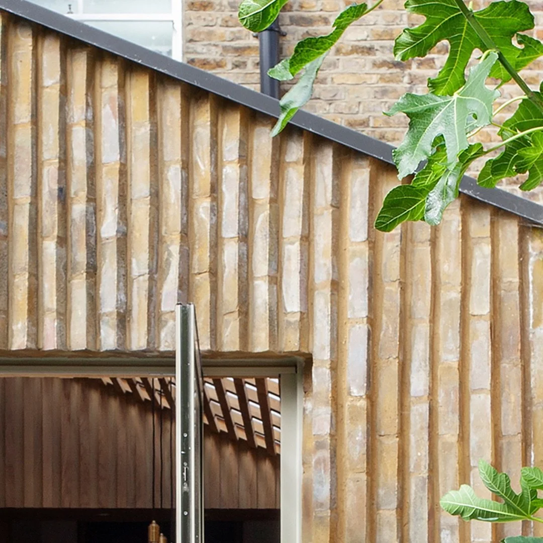 EXTENSIONS IN BRICK

Our next project on our brick series: The Slatted Extension. 

We kept it classic with yellow stock brick to stay true to the original house, but gave it a twist - literally. Laid in a sawtooth bond at 45 degrees, the bricks form