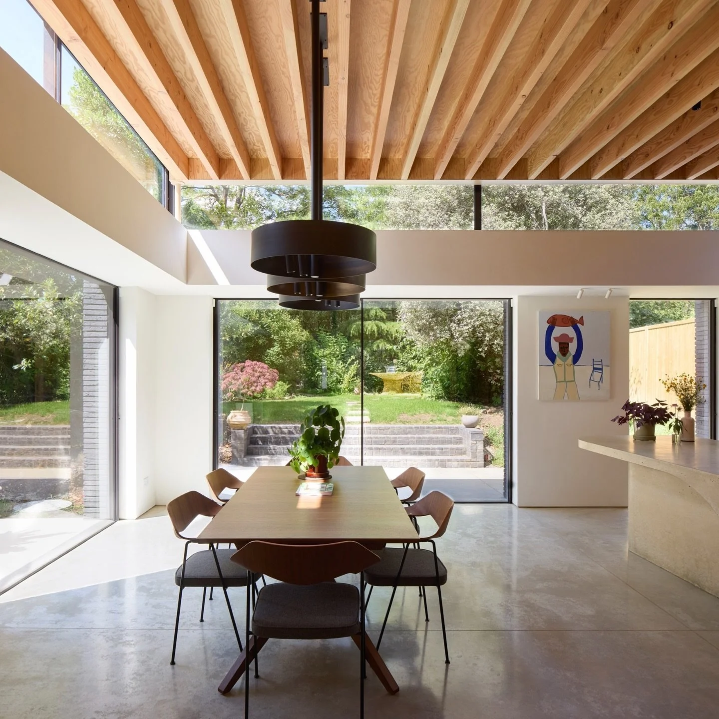 UP AND OVER

The main driver for the scheme was to replace an old two storey rear extension which was gloomy and had very low ceiling heights with a new single storey extension which would be the focus of the house. The aim was to create a very gener