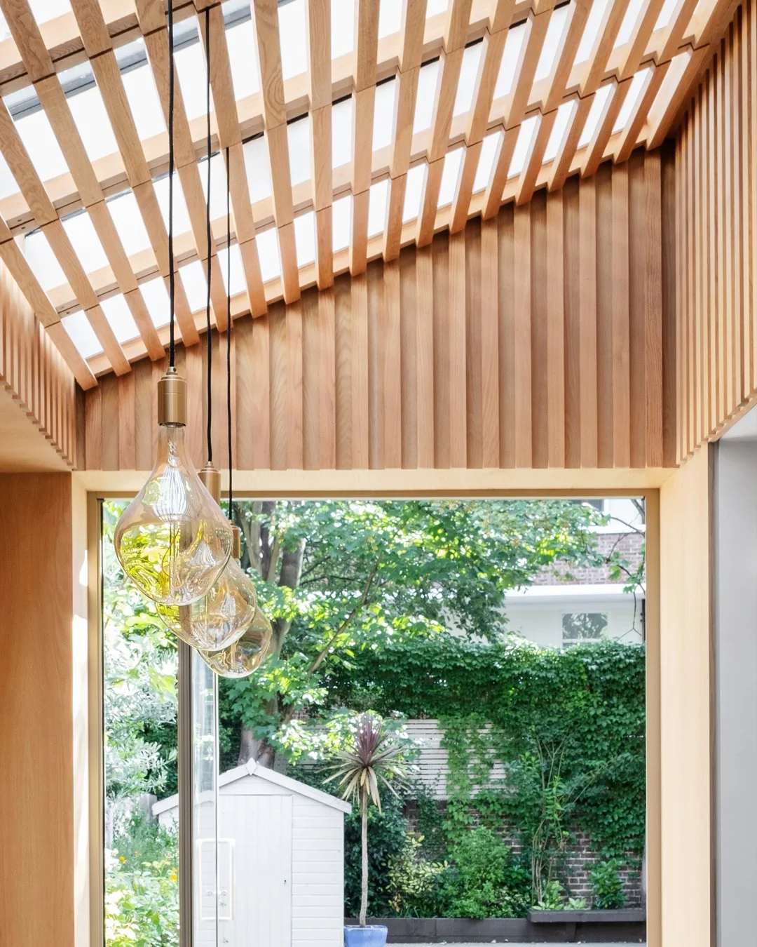 The Slatted Extension

Designed to avoid overlooking, a common problem in terraced houses. The extension itself has a fully glazed roof to bring the most amount of light into the space, including electrically opening rooflights for ventilation. To av