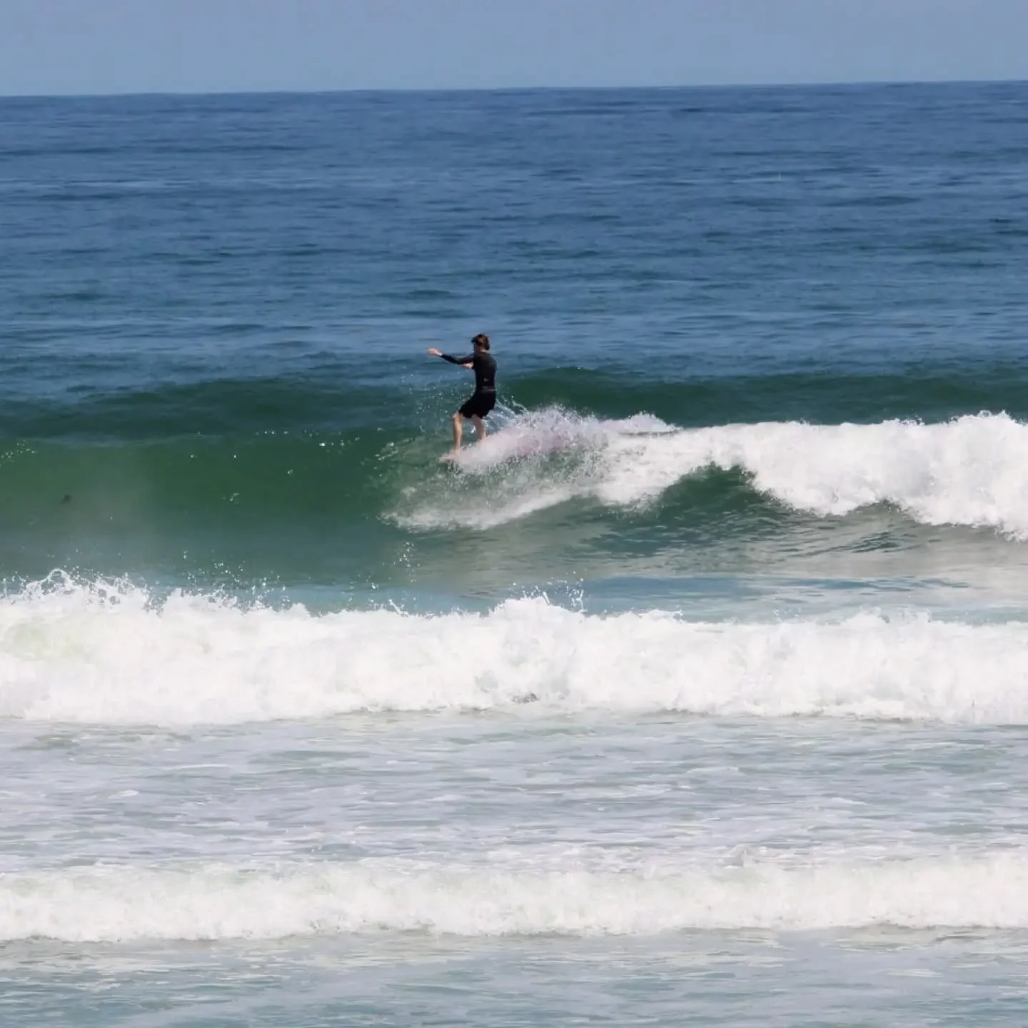 Summer time fun at "The Wall" today. Sunnys skies with waist to chest high surf and water temps in the upper 60's. @michael_rye_ripper @jm_surfer1 @jfass1999 @alexgianakos and others ☀️🌊🤙