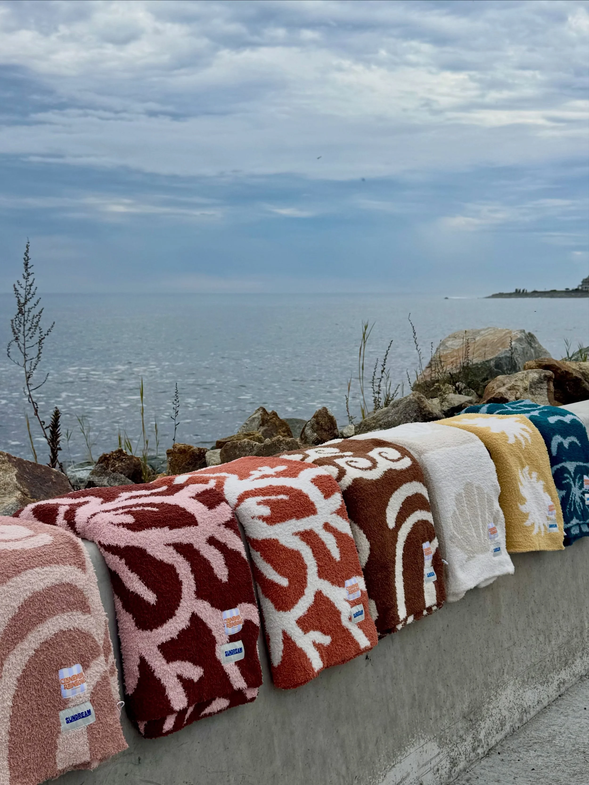 Cozy season calls for Sundream Plush Blankets 🍂☁️ Fun patterns, pops of color, and the softest feel &mdash; perfect for holiday gifting or curling up in when the temps drop 🎁🧸 Stop in and find your new favorite!