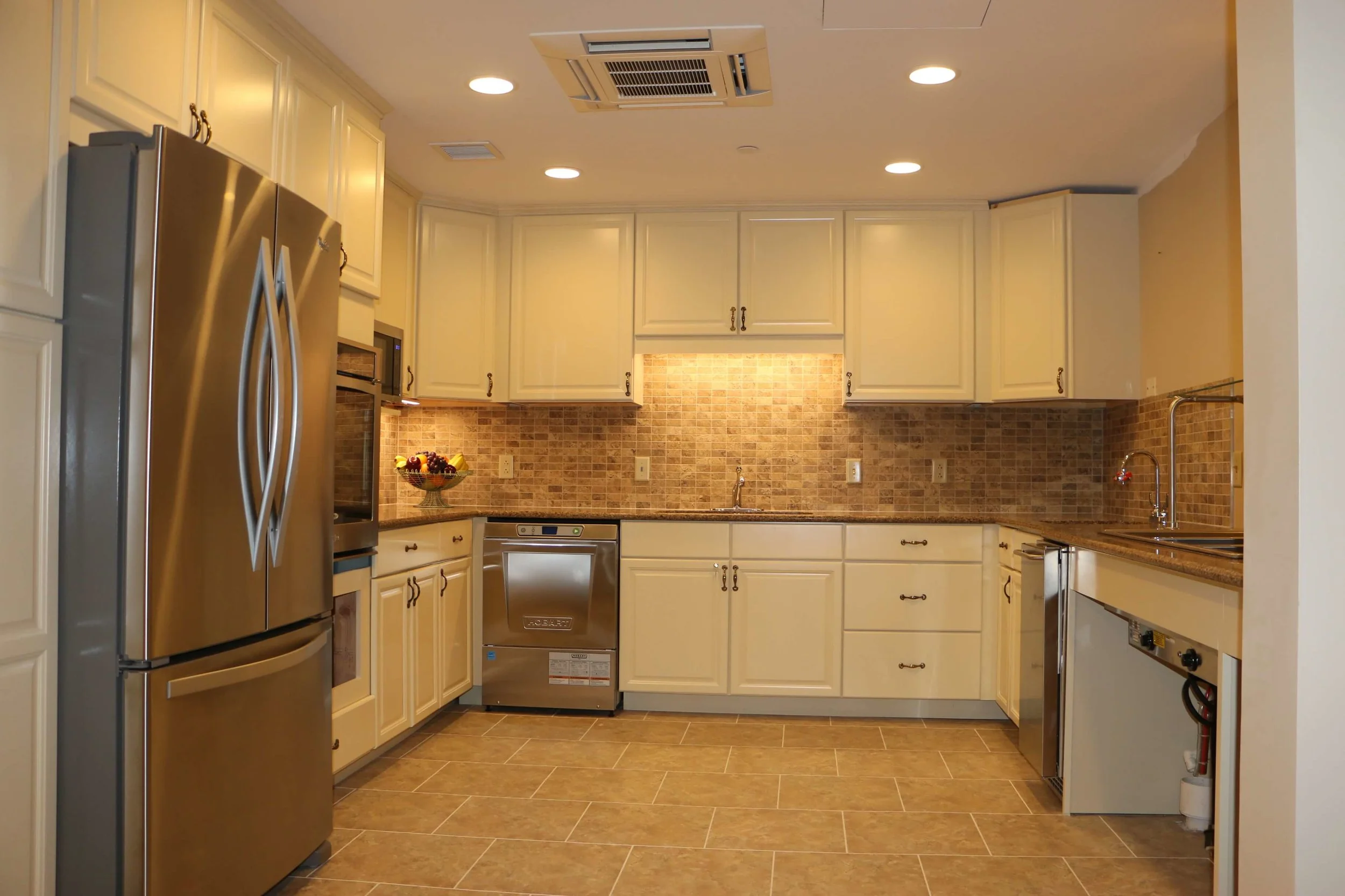 Each floor serves food from a kitchen to the residents during meal times. Meals are made in the main dining area.