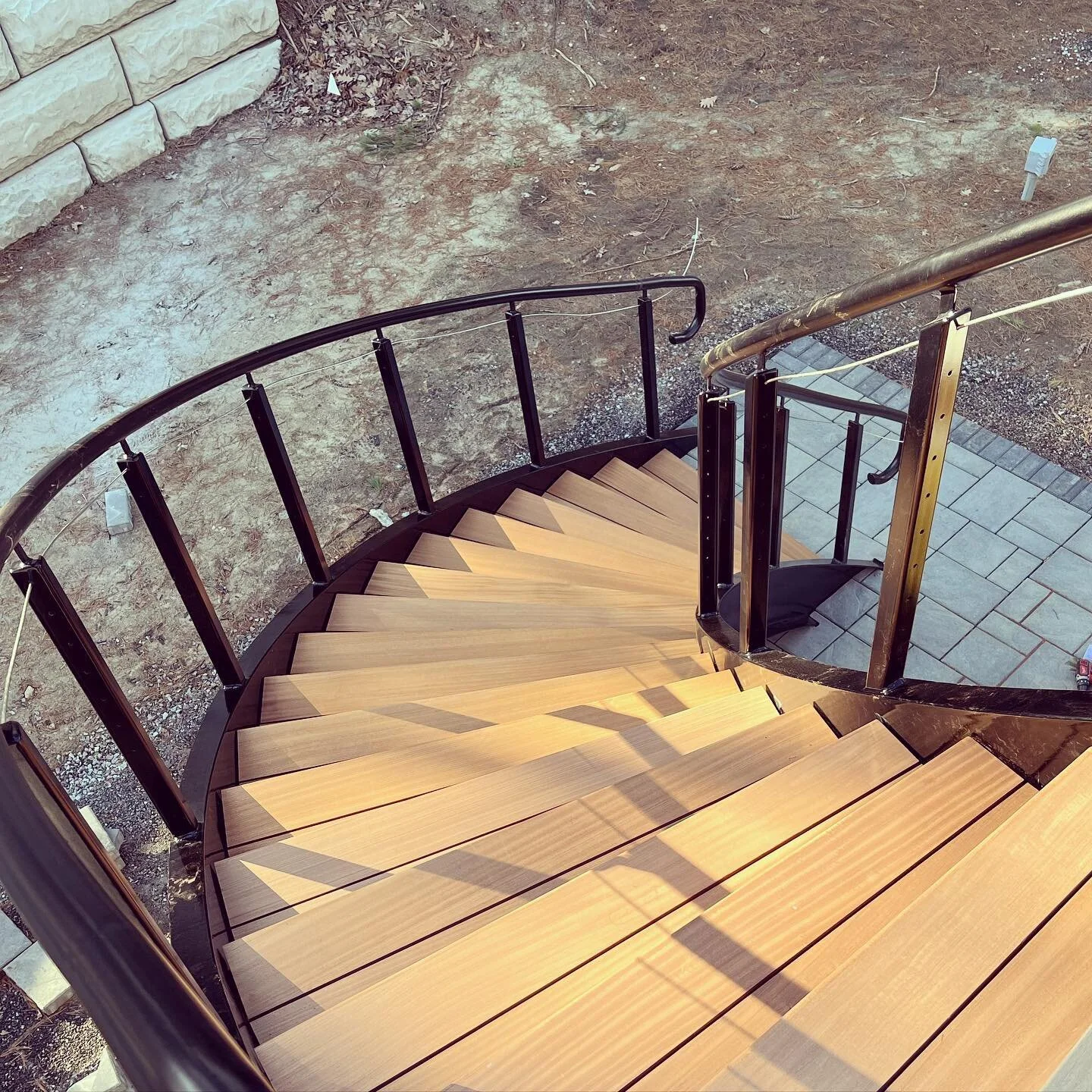 Nice 3” slab floating staircase down to the water. If you can dream it we can build it. 
Fun fact. There was only one machine on the east coast that could bend and role the c channel with the precision needed. This steal had some journeys befo