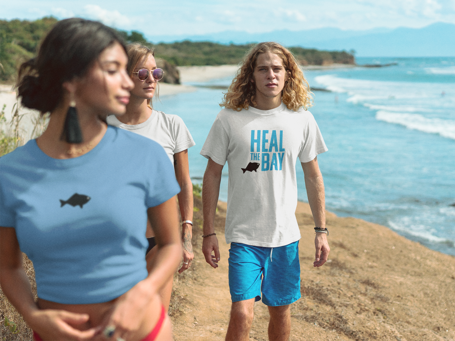 group-of-friends-walking-by-the-beach-wearing-t-shirts-mockup-a18830 (2).png