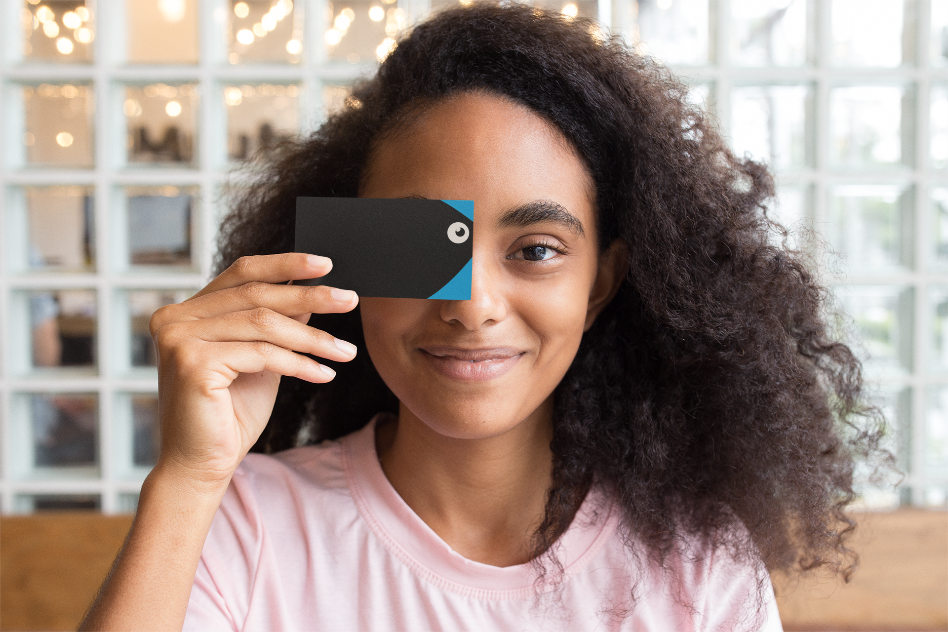 mockup-of-a-girl-holding-a-business-card-against-her-face-21922 (2).png