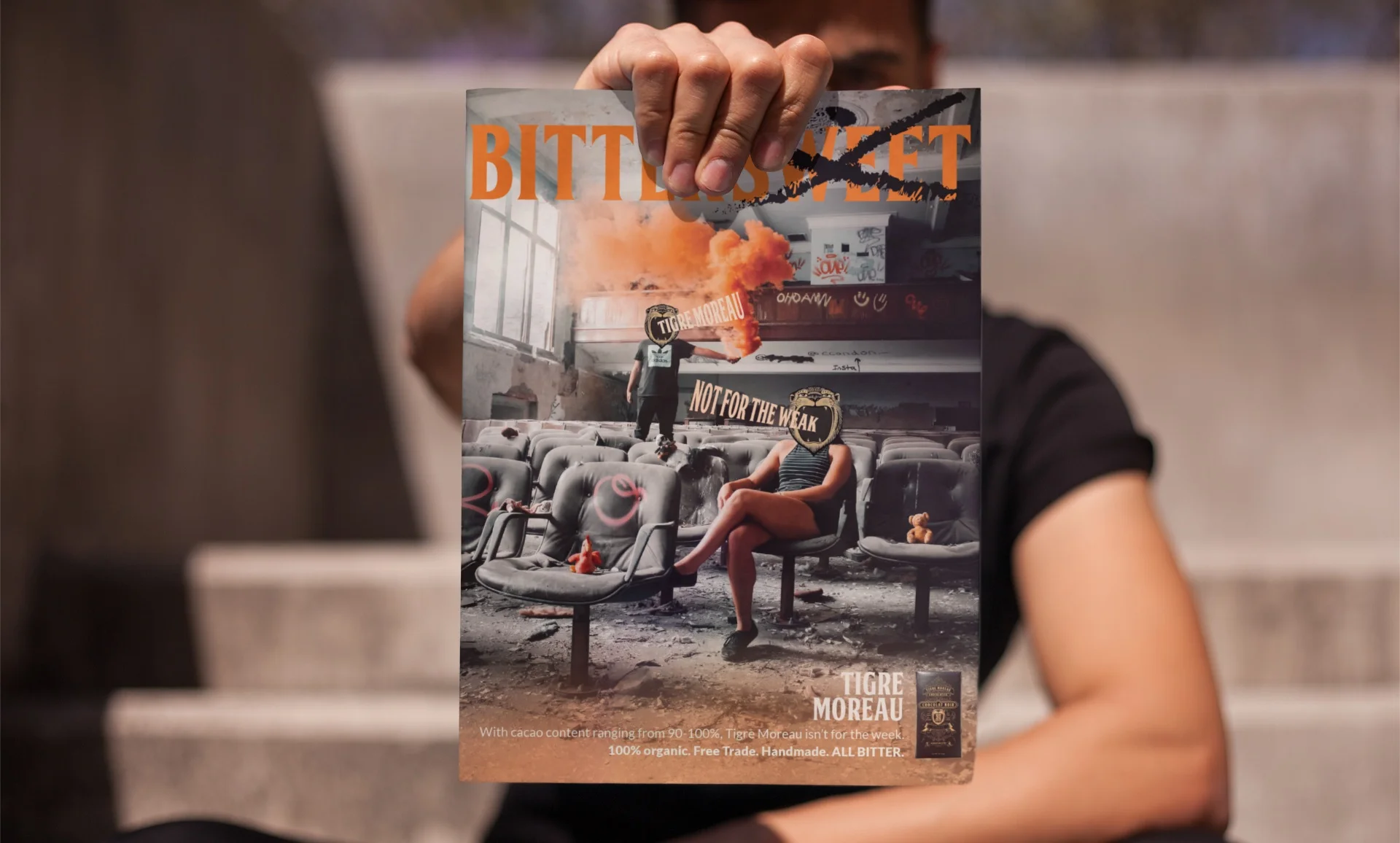 young-white-man-holding-a-magazine-while-sitting-down-in-concrete-stairways-mockup-a14449.jpg