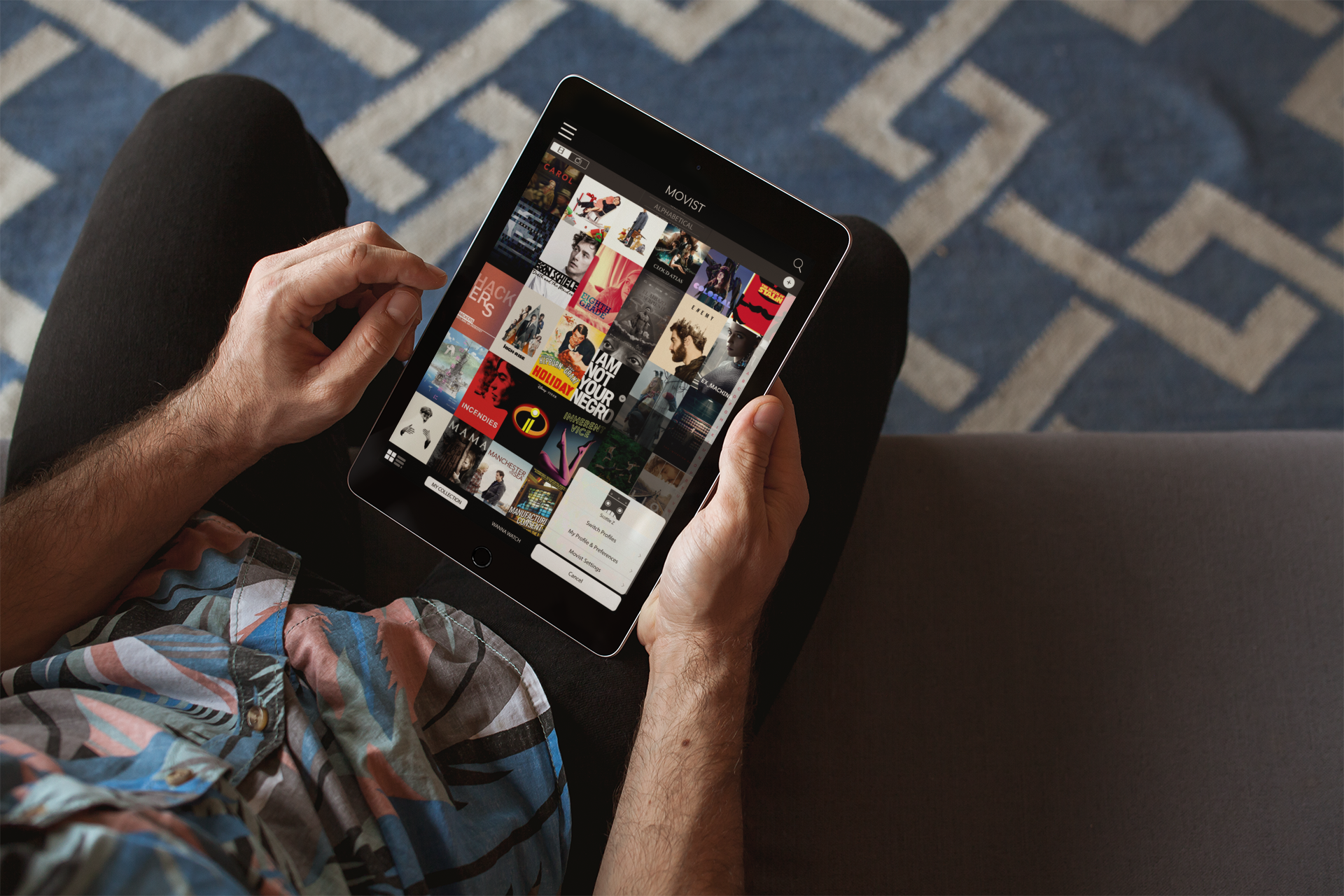 ipad-mockup-held-over-a-patterned-rug-22604.png