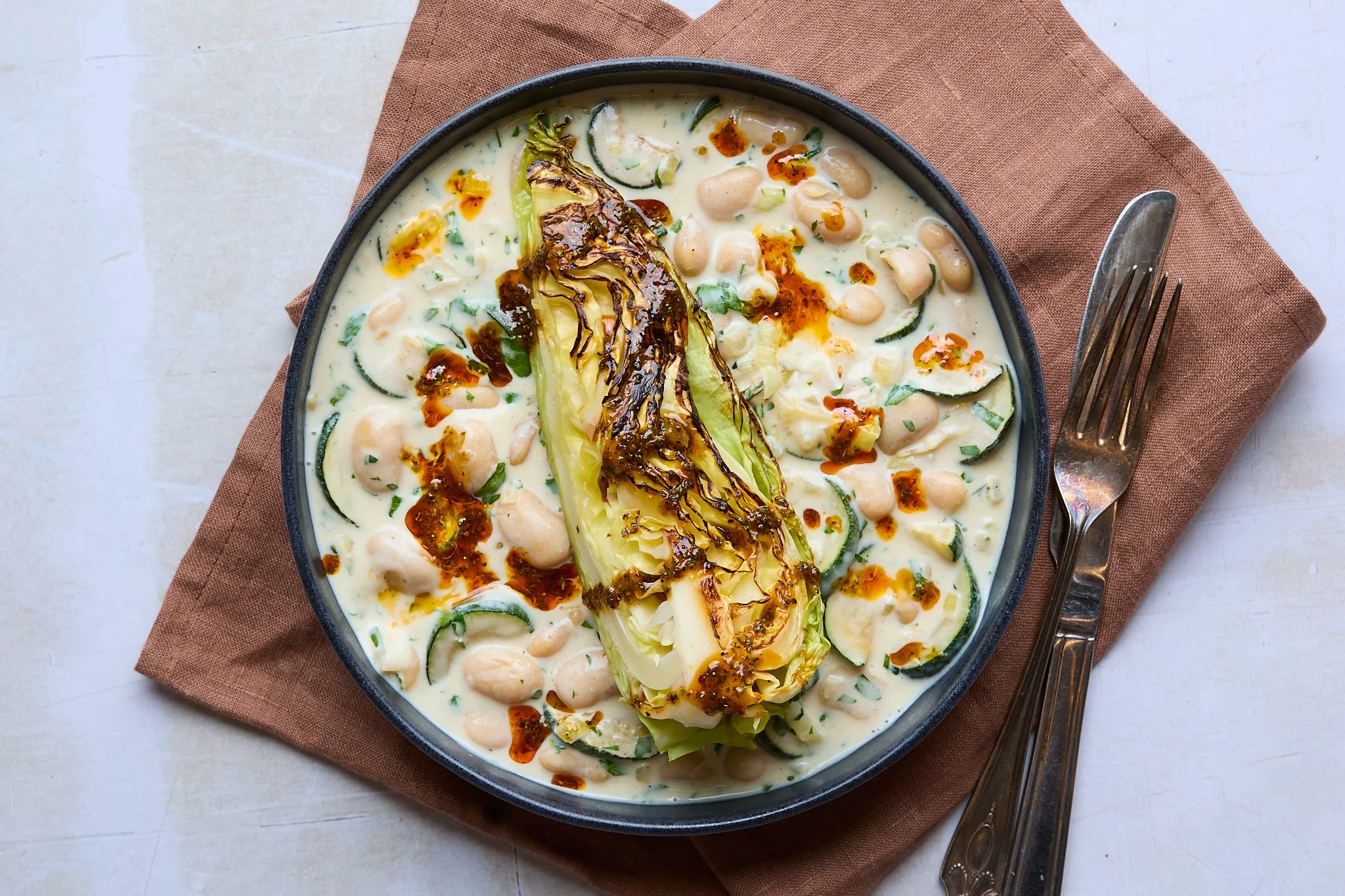 7027 Charred Cabbage on Creamy Courgette Butter Beans_OH_Crop  (1).jpg