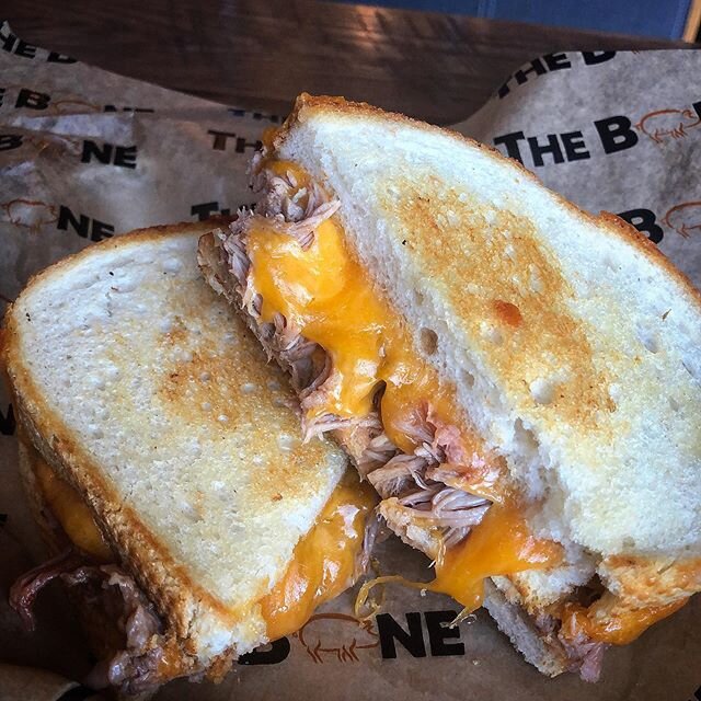 Pulled Pork Grilled Cheese - bacon jam and sharp cheddar on toasted sourdough. Available in Gainesville today!
