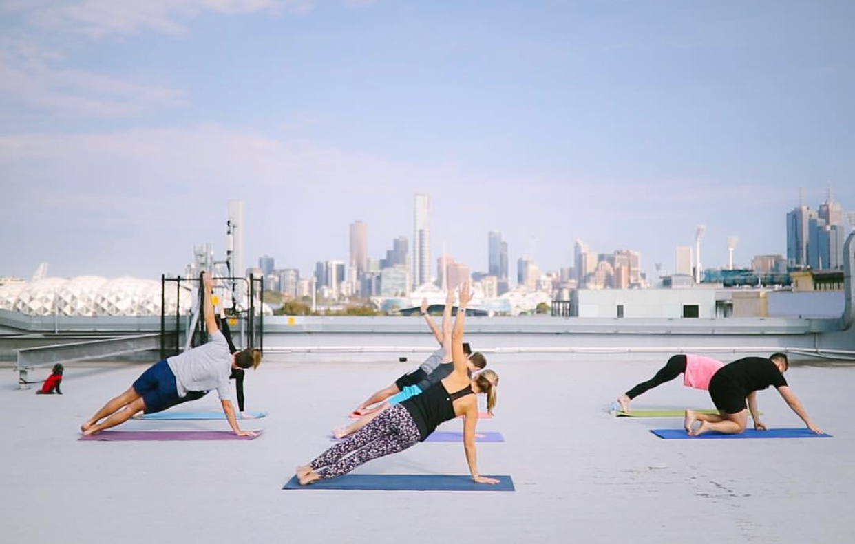 Yoga Event on Melbourne Rooftop with City Views