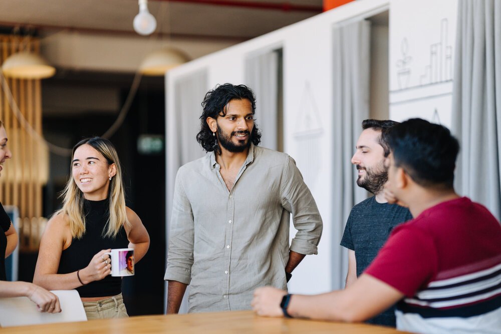 Melbourne Coworking Space Conducting an in person Meeting in Open Lounge