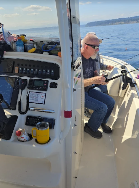 Angler with Parkinson moohing for salmon on the puget sound in September