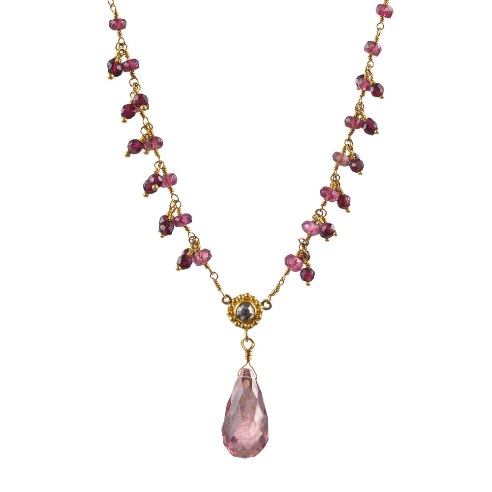 Pink+tourmaline+briolette+with+grey+diamond+pendant+on+tourmaline+and+garnet+chain.jpg