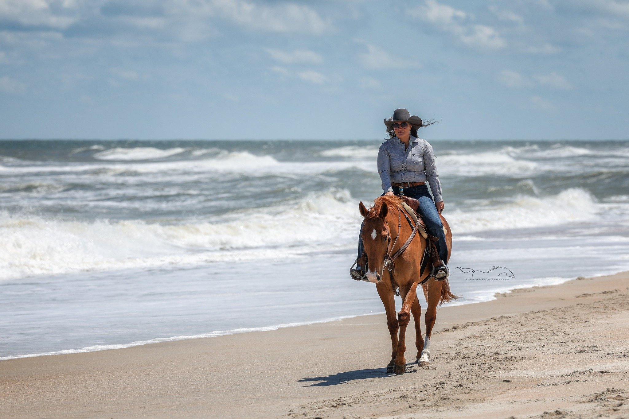 Shoot on the beach at 2:00 pm? Sure! This was the prettiest day we could have hoped for. Beautiful cool breezy weather. The waves were crashing and the sand was blowing and the horses were as sweet as could be. I loved getting to photograph horses at