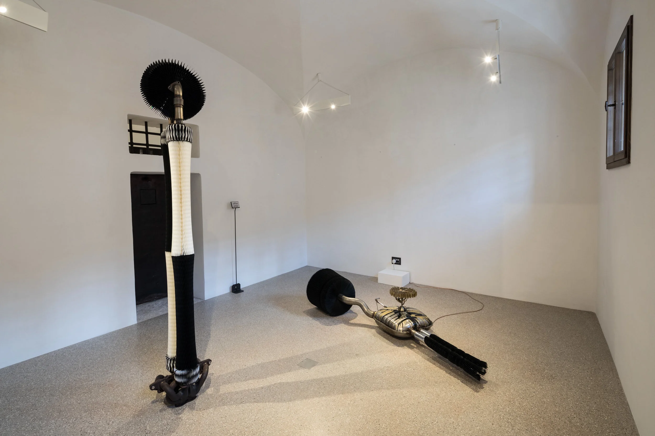  Keita Miyazaki,  Black Tree  (2014);  Circulated Duality  (2016) Exhaust pipe and paper. 