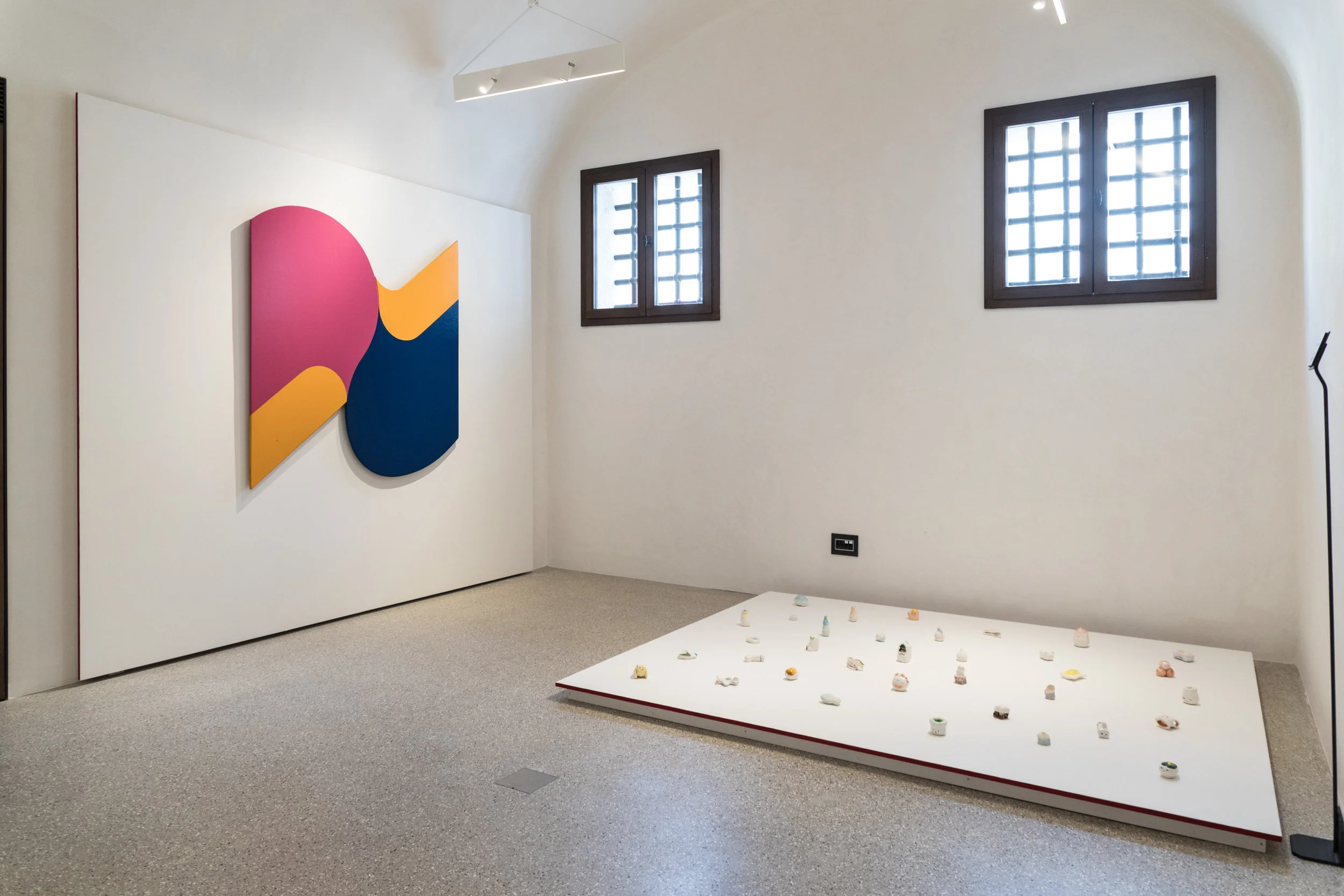  Left: Shu Takahashi,  La Trinità  (1969) Nitro enamel paint on canvas; Bottom: Kenichi Ogawa,  Sleepers  (2014 - 2017) Ceramics. 