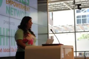 Rene-speaking-300x200.jpg