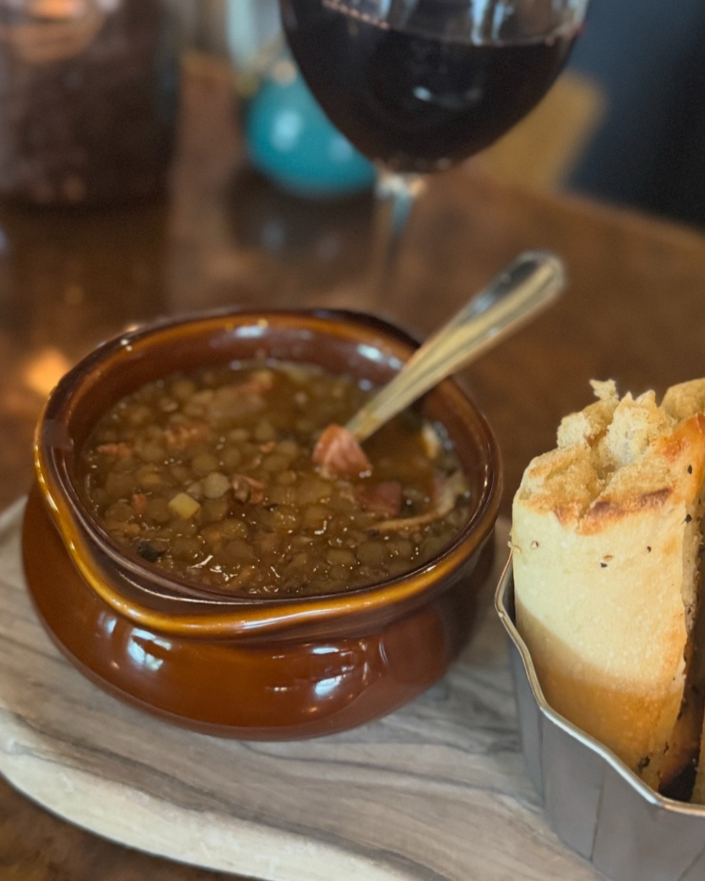 Soup of the Month: Abuelitas Lentil Soup!! 🤤

Chorizo, Bacon,Sausage, Lentils, garlic and onions in a warm tomato jalape&ntilde;o chicken broth &hellip; so good! 

Who knew in May we would be needing this soup to keep us warm &amp; comfy and out of 