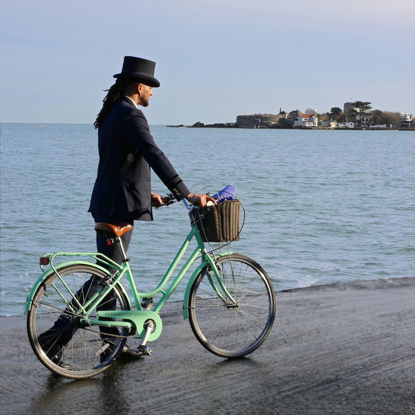 DOORMAN ADVENTURES // Our senior doorman was spotted in the wild. He was seen using a HH bike, beach bag, and towel&mdash;complimentary for all guests during their stay. Prepping for the traditional Christmas Day dip, anyone?