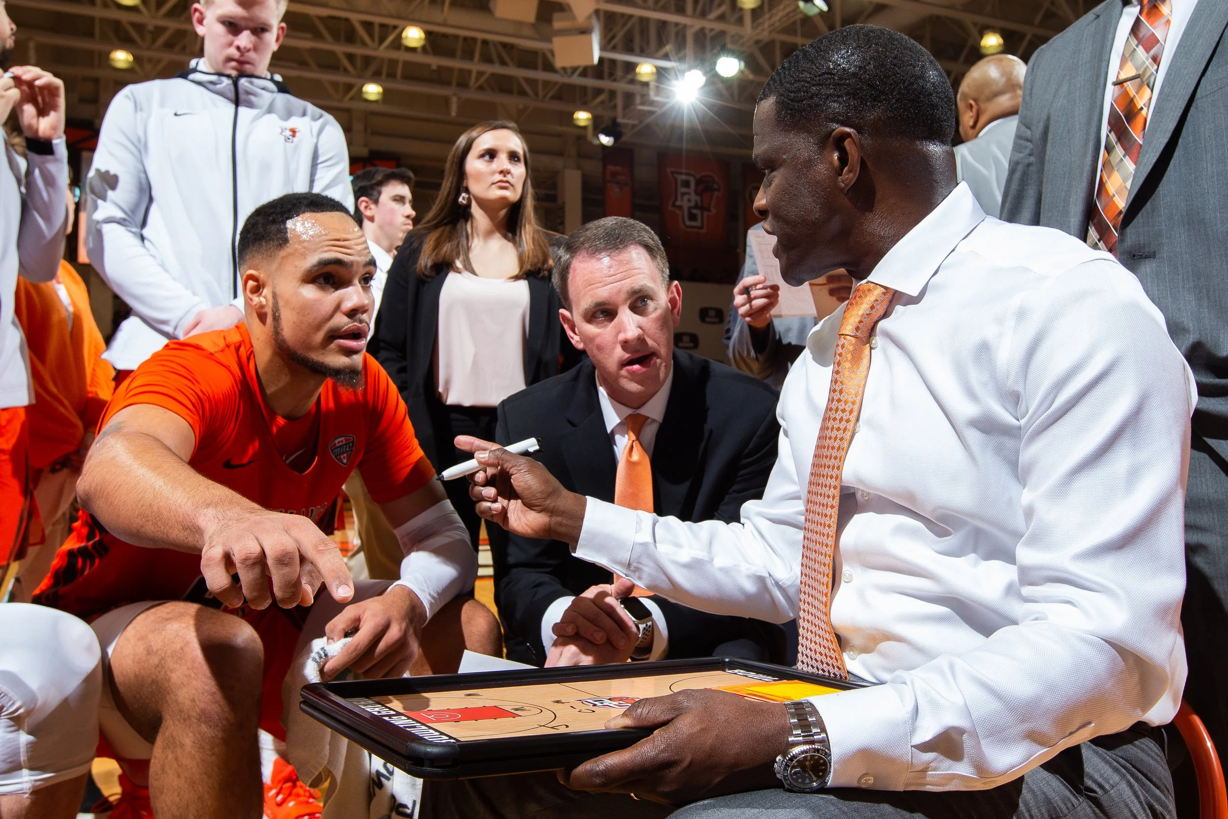  BOWLING GREEN, OH, FEBRUARY 8: Marlon Sierra #22 of Bowling Green Falcons talks to head coach Michael Huger of Bowling Green Falcons during a timeout against Toledo Rockets on February 8, 2020.  