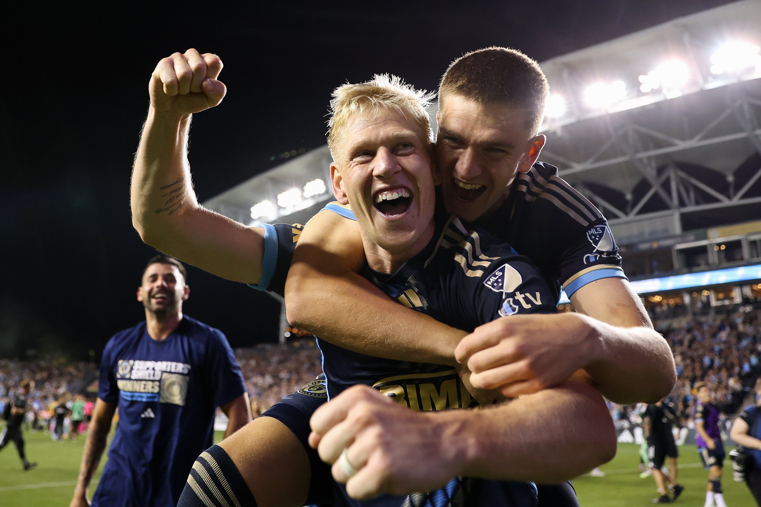  CHESTER, PENNSYLVANIA - OCTOBER 4: Jakob Glesnes #5 of the Philadelphia Union, Mikael Uhre #7 of the Philadelphia Union and Tai Baribo #9 of the Philadelphia Union celebrates after defeating the New York City FC, 1-0, winning the Supporters’ Shield 