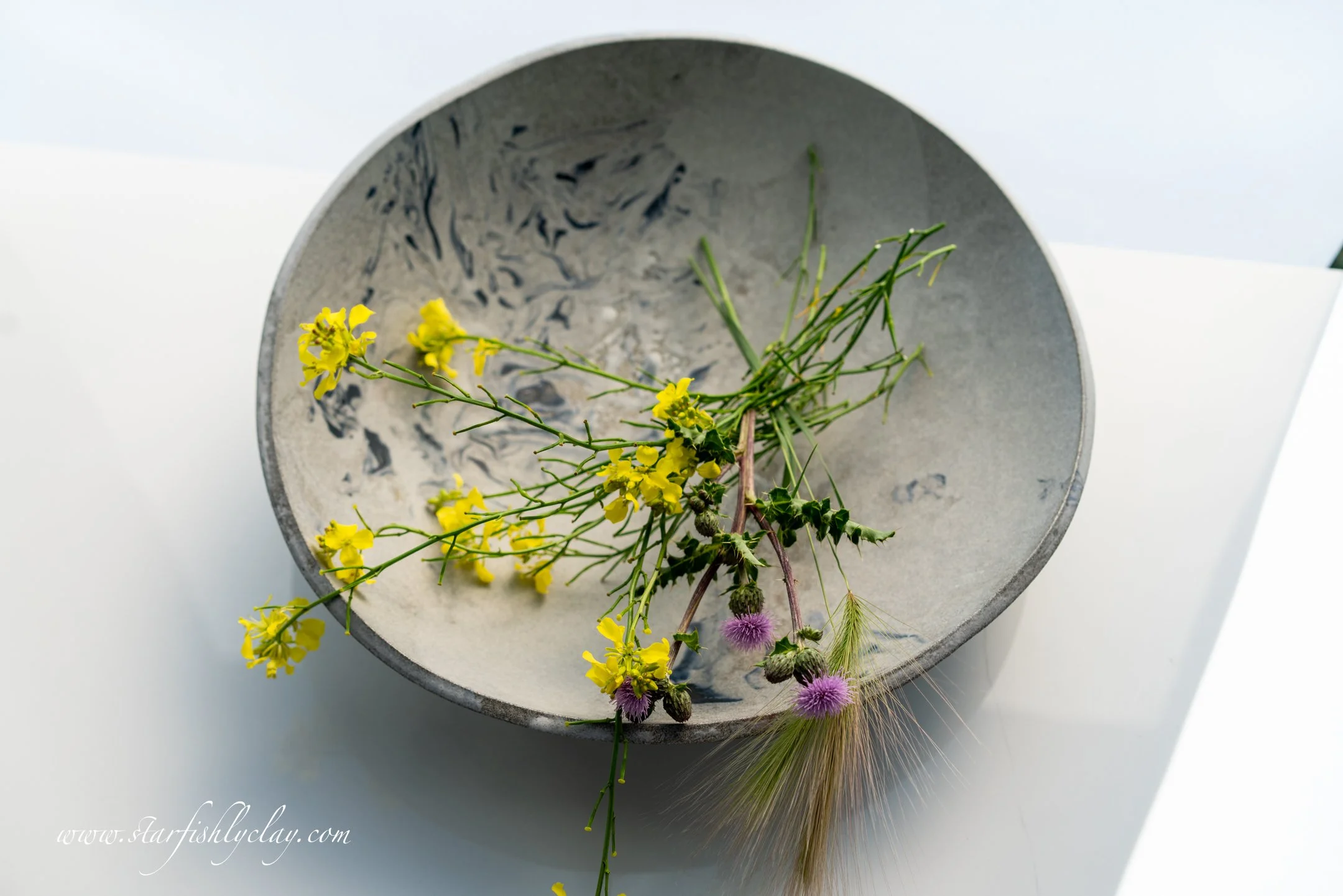 This bowl has a beautiful, organic marbled texture with a soft, earthy glaze. Handmade in YYC. Calgary. Alberta. Made in Canada. Handmade Ceramics. Locally made Pottery.